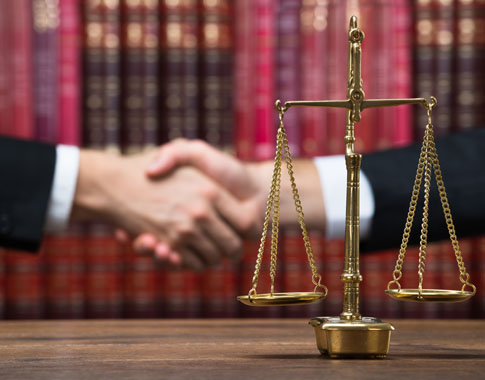 Men shaking hands symbolizing agreement